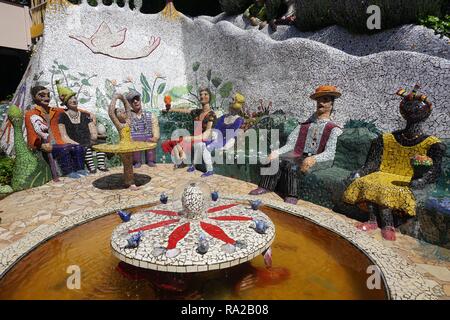 Il relax nel Giardino del Gigante in casa Akaroa, Nuova Zelanda Foto Stock