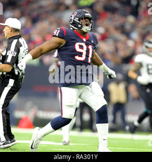 Houston, Texas, Stati Uniti d'America. 30 Dic, 2018. Houston Texans difensivo fine Carlos Watkins (91) celebra un grande gioco sulla difesa durante il quarto trimestre di NFL stagione regolare il gioco tra la Houston Texans e Jacksonville Jaguars a NRG Stadium di Houston, TX su dicembre 30, 2018. Credito: Erik Williams/ZUMA filo/Alamy Live News Foto Stock