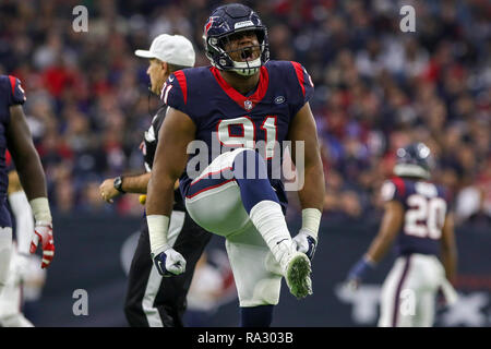 Houston, TX, Stati Uniti d'America. 30 Dic, 2018. Houston Texans difensivo fine Carlos Watkins (91) celebra dopo un placcaggio per la perdita nel corso del quarto trimestre a fronte di Jacksonville Jaguars a NRG Stadium di Houston, TX. John Glaser/CSM/Alamy Live News Foto Stock