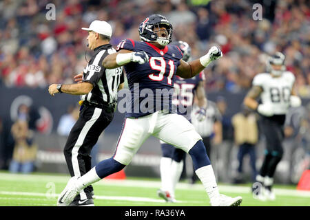 Houston, Texas, Stati Uniti d'America. 30 Dic, 2018. Houston Texans difensivo fine Carlos Watkins (91) celebra un grande giocare in difesa durante la NFL stagione regolare il gioco tra la Houston Texans e Jacksonville Jaguars a NRG Stadium di Houston, TX su dicembre 30, 2018. Credito: Erik Williams/ZUMA filo/Alamy Live News Foto Stock