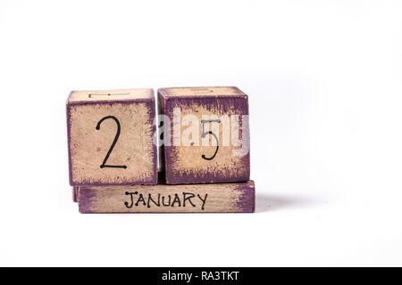 In legno colorato blocco calendario perpetuo che mostra 25 Gennaio Foto Stock