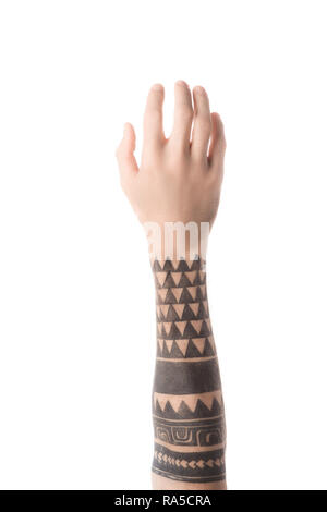 Vista dall'alto di tatuati uomo afferrando qualcosa con la mano isolato su bianco Foto Stock