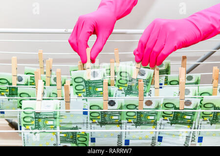 Foto simbolico di riciclaggio di denaro sporco, Symbolfoto Geldwaesche Foto Stock