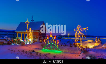 Il Parkside Pioneer Patch con le luci di Natale in inverno, Winkler, Manitoba, Canada. Foto Stock