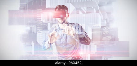 Immagine composita dell'uomo utilizzando la realtà virtuale auricolare Foto Stock