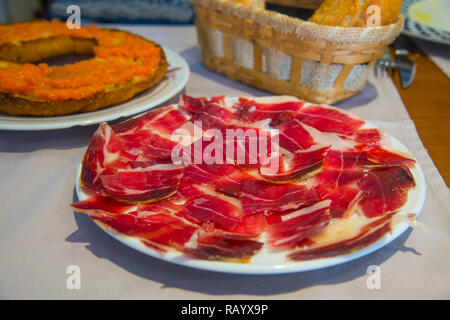 Prosciutto Iberico di servire. Spagna. Foto Stock