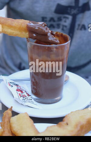 Churros al cioccolato Foto Stock