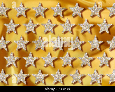 Golden Stars shining gem sfondo di pietra Foto Stock