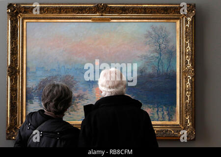 Petit Palais museum, Parigi, Francia. Claude Monet Soleil couchant sur la Seine à Lavacourt, effet d'hiver (Tramonto sulla Senna, d'inverno), 1880, olio su tela. Foto Stock