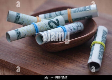 Laminati di dollari simboleggiata come prodotto alimentare Foto Stock