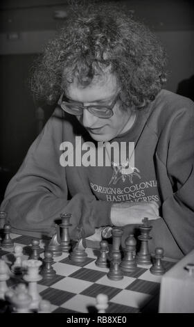 Jonathan Simon "Jon Speelman". Inglese Grandmaster giocatore di scacchi, matematico e scrittore di scacchi giocando a Hastings 66internazionale annuale congresso scacchi. Torneo di Premier. 1990, Inghilterra, Regno Unito Foto Stock