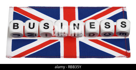 La parola Business sillabato su una bandiera dell'Union Jack Foto Stock