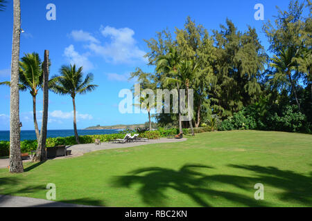 DT Fleming Beach Park, a nord-ovest di Maui, Hawaii. Una bellissima spiaggia di sabbia bianca con una buona piscina (ha) bagnino, servizi igienici e area pic-nic Foto Stock