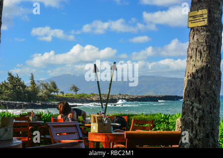 DT Fleming Beach Park, a nord-ovest di Maui, Hawaii. Una bellissima spiaggia di sabbia bianca con una buona piscina (ha) bagnino, servizi igienici e area pic-nic Foto Stock