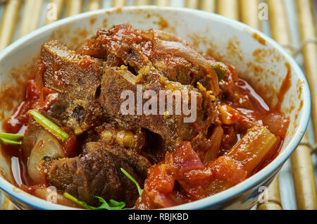 Rampuri korma, cucina Rampuri, Montone gambe cotte nel sugo denso Foto Stock