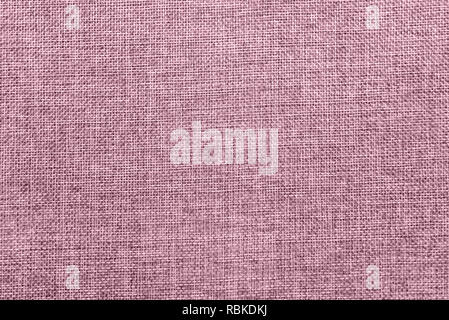 Vuoto sfondo astratto con tela naturale texture dettagliate. Ecologia friendly ruvida filettature in tessuto colorato in miscela di rosa pallido e di colore bianco. Foto Stock