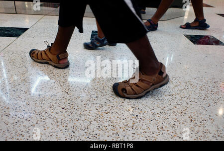 Usura del piede e piedi Foto Stock