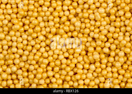 Gomma arancione sfondo sferico. Abstract food texture. Foto Stock