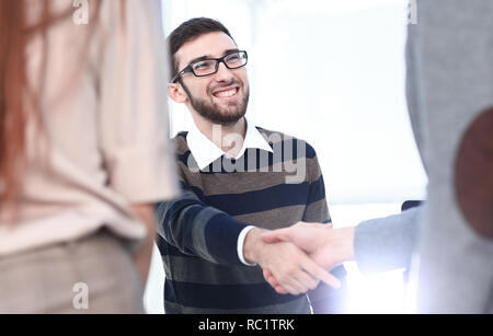 Manager di stretta di mano e il client. Foto Stock