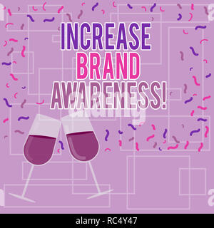 Testo che mostra segni di aumentare la consapevolezza del marchio. Foto concettuale ottenere influenzatori per visualizzare la tua arte o riempiti di prodotto Vino tostatura di vetro per la celebrazione Foto Stock