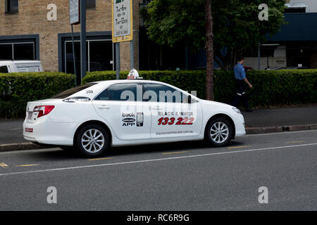 Un Bianco & Nero taxi a Brisbane city centre, Queensland, Australia Foto Stock