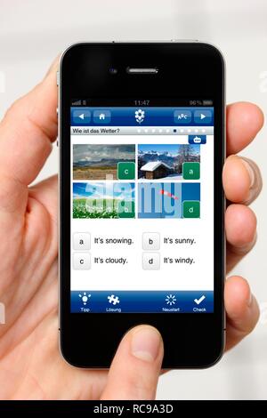 Iphone, smart phone, app sullo schermo, la formazione linguistica e l'apprendimento della lingua inglese Foto Stock