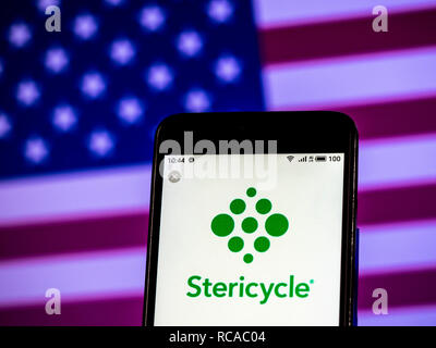 Stericycle logo azienda vede visualizzato sul telefono intelligente. Foto Stock