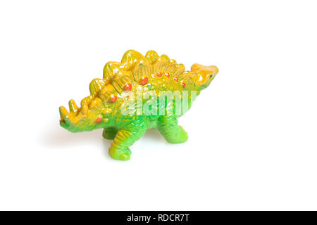 A buon mercato e divertente in plastica isolato di dinosauro Foto Stock