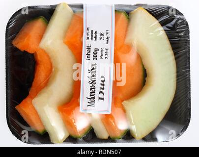 Fette di melone, confezionati per il consumo immediato Foto Stock