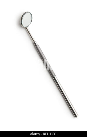 Strumenti odontoiatrici. Dentisti strumenti. Specchio dentale isolati su sfondo bianco. Foto Stock