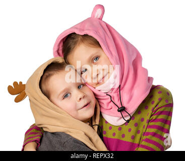 Un ragazzo e una ragazza in caldi cappelli di carnevale Foto Stock