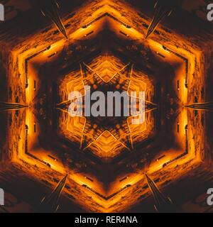 Immagine grafica con caleidoscopio stile design abstract colori caldi Foto Stock