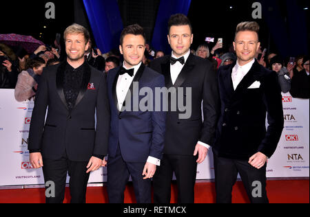 Westlife's Kian Egan, Shane Filan, Markus Mark e Nicky Byrne (sinistra-destra) che frequentano il National Television Awards 2019 tenutasi presso l'O2 Arena, Londra. Foto Stock