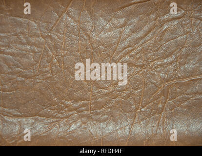 Superficie decorativa imitando artificialmente realizzata in pelle. La foto è stata scattata nelle ore diurne, primo piano. Foto Stock