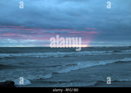 Alba invernale in spiaggia Foto Stock