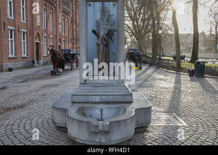 Testa di cavallo fontana, Bruges Foto Stock