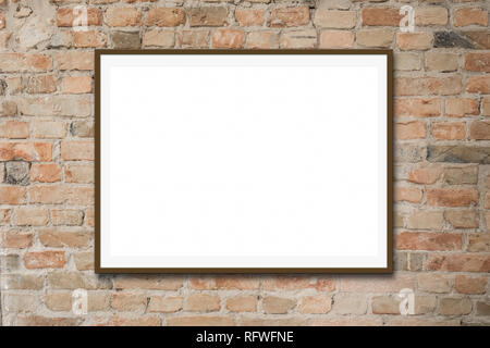 Vuoto cornice immagine / tela bianca mock-up sul muro di mattoni Foto Stock