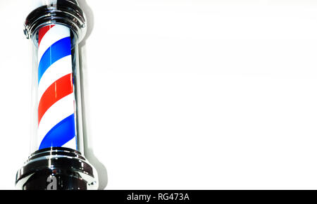 Barbiere pole closeup su sfondo semplice. Foto Stock