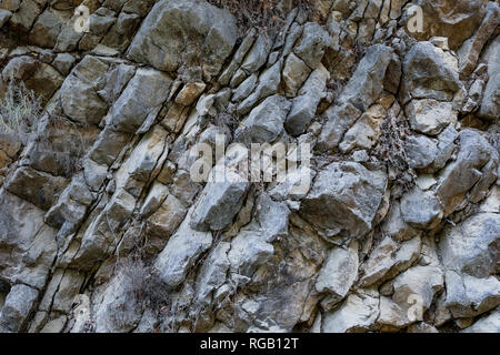 Close-up naturale stratificato grigio razza di montagna come sfondo. Foto Stock