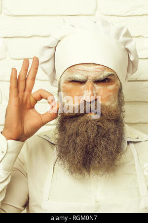 L'uomo con la farina sulla faccia Foto Stock