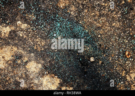 Ruvido grunge texture di superficie con rocce e il vetro rotto Foto Stock