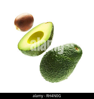 Avocado con sementi isolato su uno sfondo bianco Foto Stock