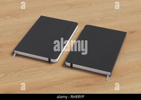 Notebook verticale nero con fascia elastica su sfondo in legno. Copertina anteriore e posteriore Foto Stock