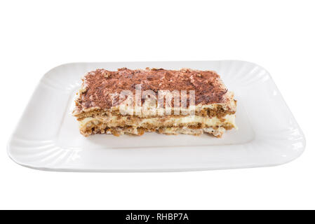 Fetta di gustosi piatti fatti in casa il tiramisù su sfondo bianco Foto Stock