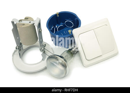 Gli accessori per l'installazione dei dispositivi di illuminazione nell'appartamento su sfondo bianco Foto Stock