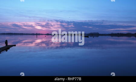 Sunset tappe al porto bossom Foto Stock