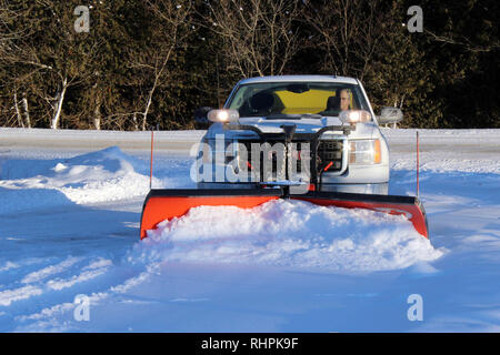 Snow Plough business operatore Foto Stock