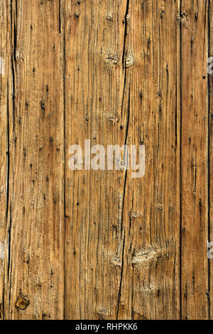 Vecchio legno incrinato il pannello verticale di sfondo Foto Stock