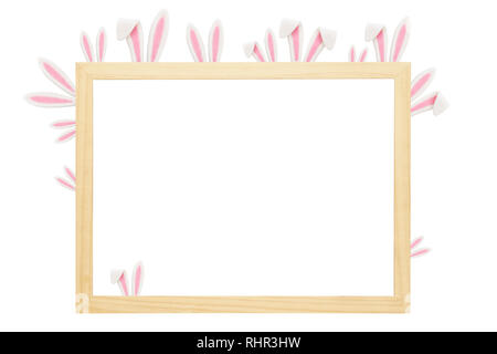 Funny Easter photo frame decorate con orecchie di coniglietto. Creative Design mockup. Isolato. Foto Stock