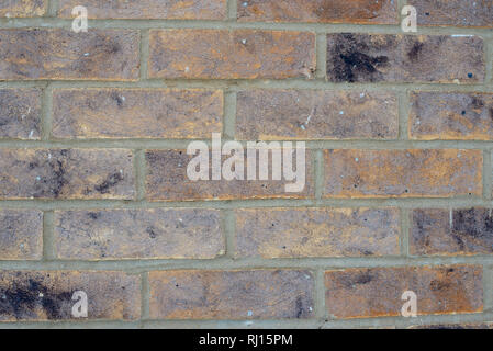 Sbiadito vecchio beige marrone a muro di mattoni texture dello sfondo. Foto Stock